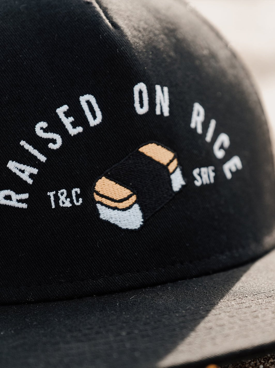 T&C Surf Designs Raised On Musubi Trucker Cap,